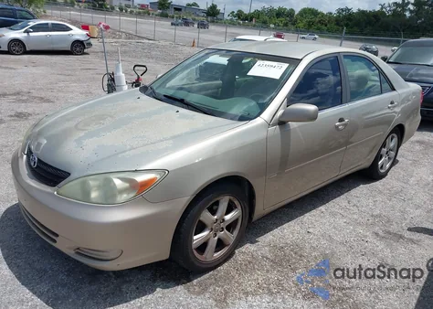 2002 Toyota Camry Le z USA, uszkodzony, nr VIN 4T1BE32K12U565567